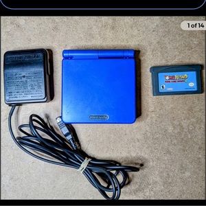 BLUE Nintendo game boy advance SP. Comes with 4 games